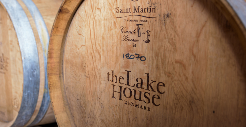 Age wine in oak barrels